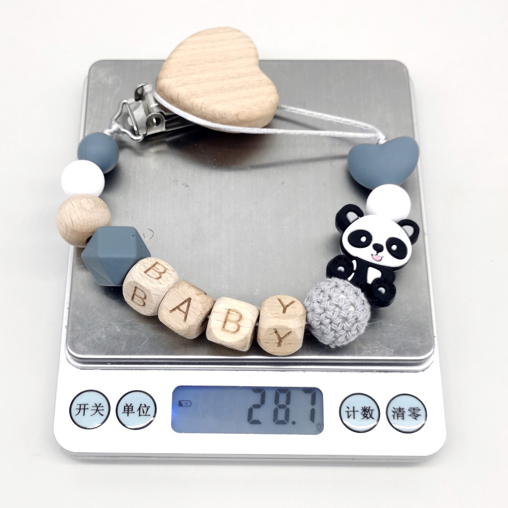 木製のパーソナライズされたベビーおしゃぶりチェーン、かわいい - Baby Teethers のレビューと価格