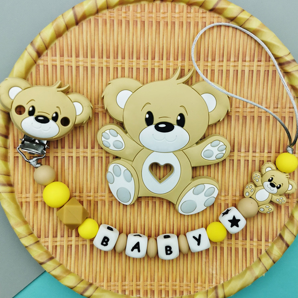 数字と文字でパーソナライズされたシリコンおしゃぶりクリップ, - Baby Teethers のレビューと価格