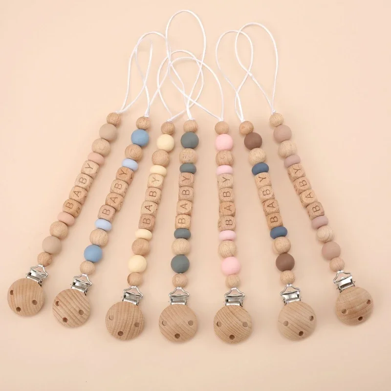 パーソナライズされた赤ちゃんのおしゃぶりクリップ,名前のおし - Baby Teethers のレビューと価格