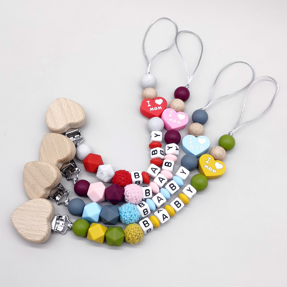 カスタマイズ可能な名前入りベビー歯固めおしゃぶりクリップ、シ - Baby Teethers のレビューと価格